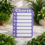 Purple chore chart with days of the week on a marble surface surrounded by plants
