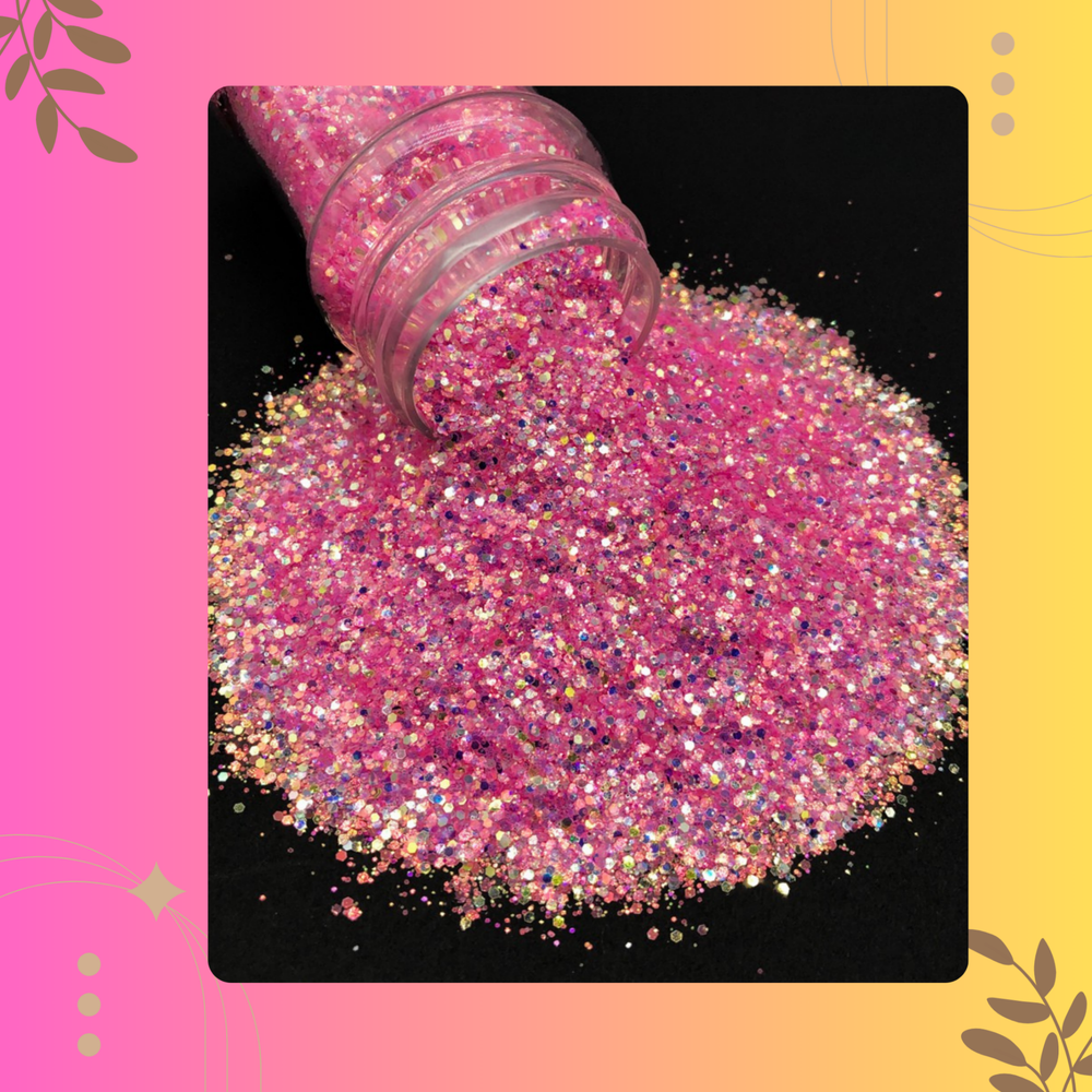 Pink glitter being poured from a jar onto a black surface with a colorful border.