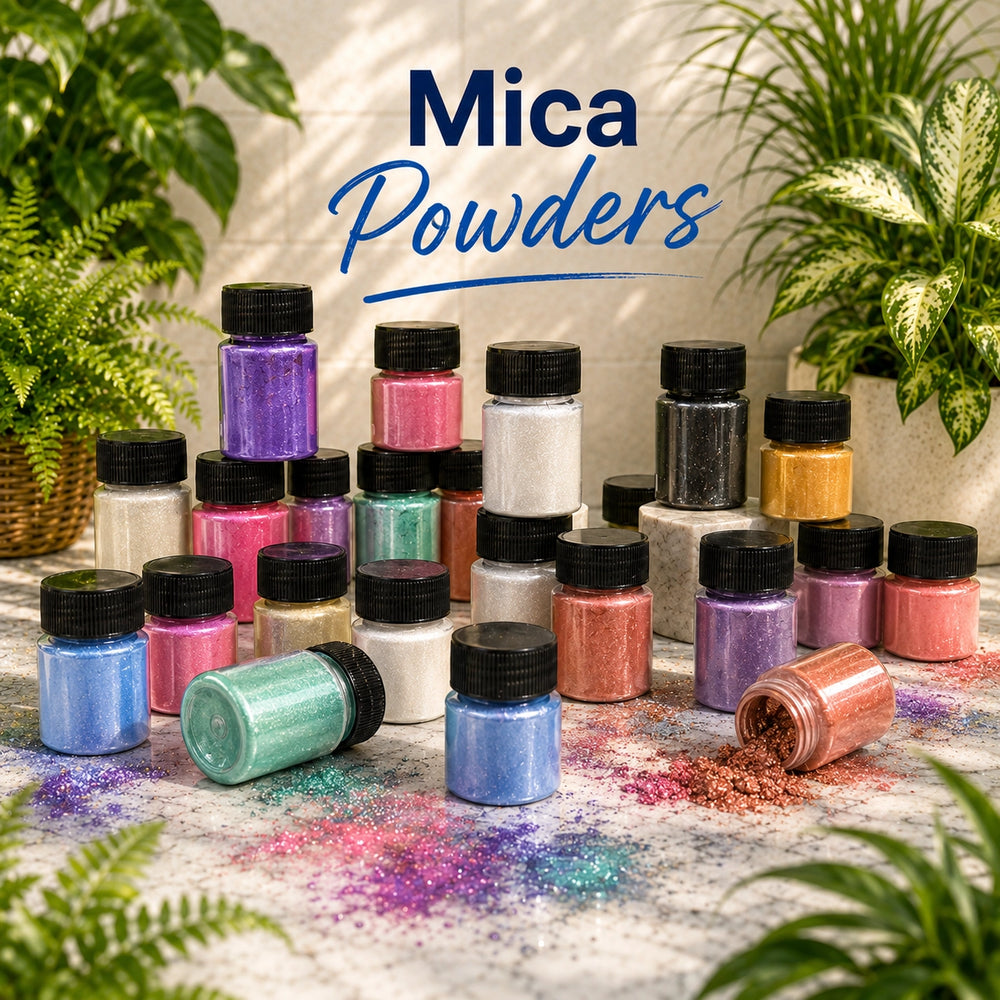 Collection of colorful mica powders with plants in the background