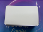 Silver rectangular object with 'Rhinestone Empire' branding on a blue background
