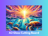 Glass cutting board with a colorful ocean scene featuring turtles and a sunset.