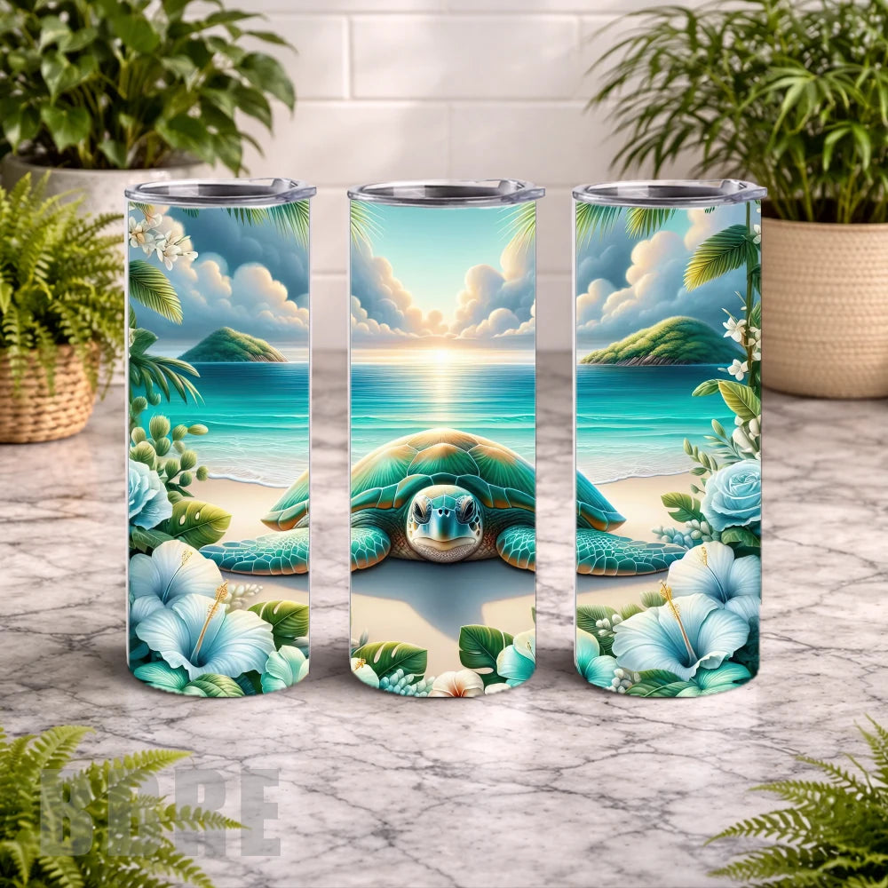 Three tumbler with a turtle design on a marble surface with plants in the background
