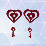Red heart-shaped key pendants on a light blue geometric patterned background