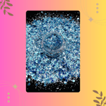 Blue glitter in a clear container on a colorful background