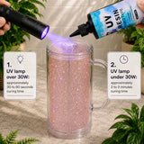 Person applying UV resin to a glittery mug with UV lamp and text indicating curing times.